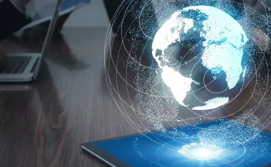 Holographic globe rising from a tablet